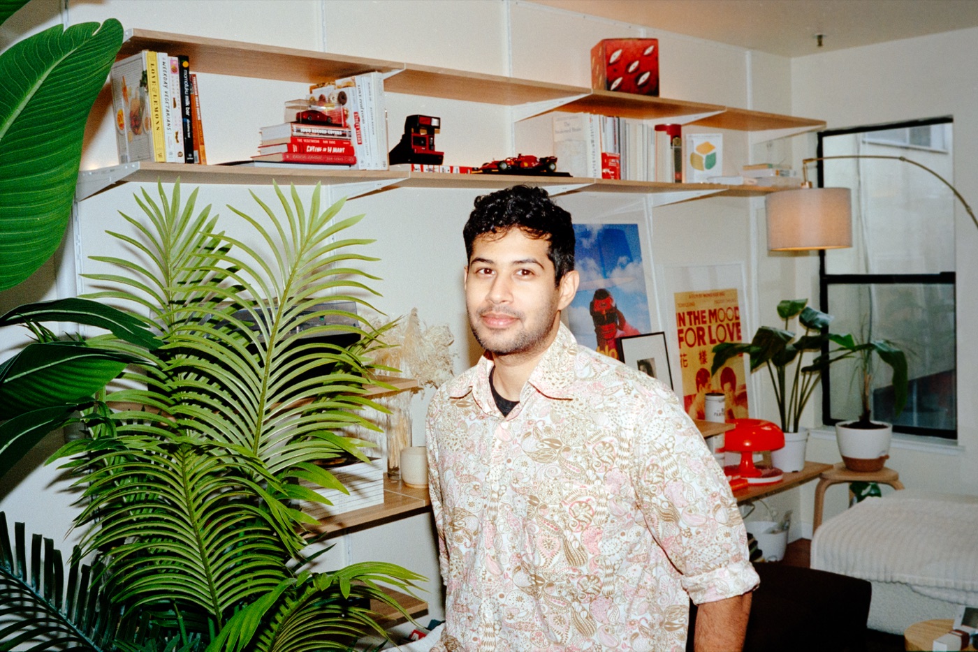 Neil Sethi smiling at home, photographed by Tyler Wang